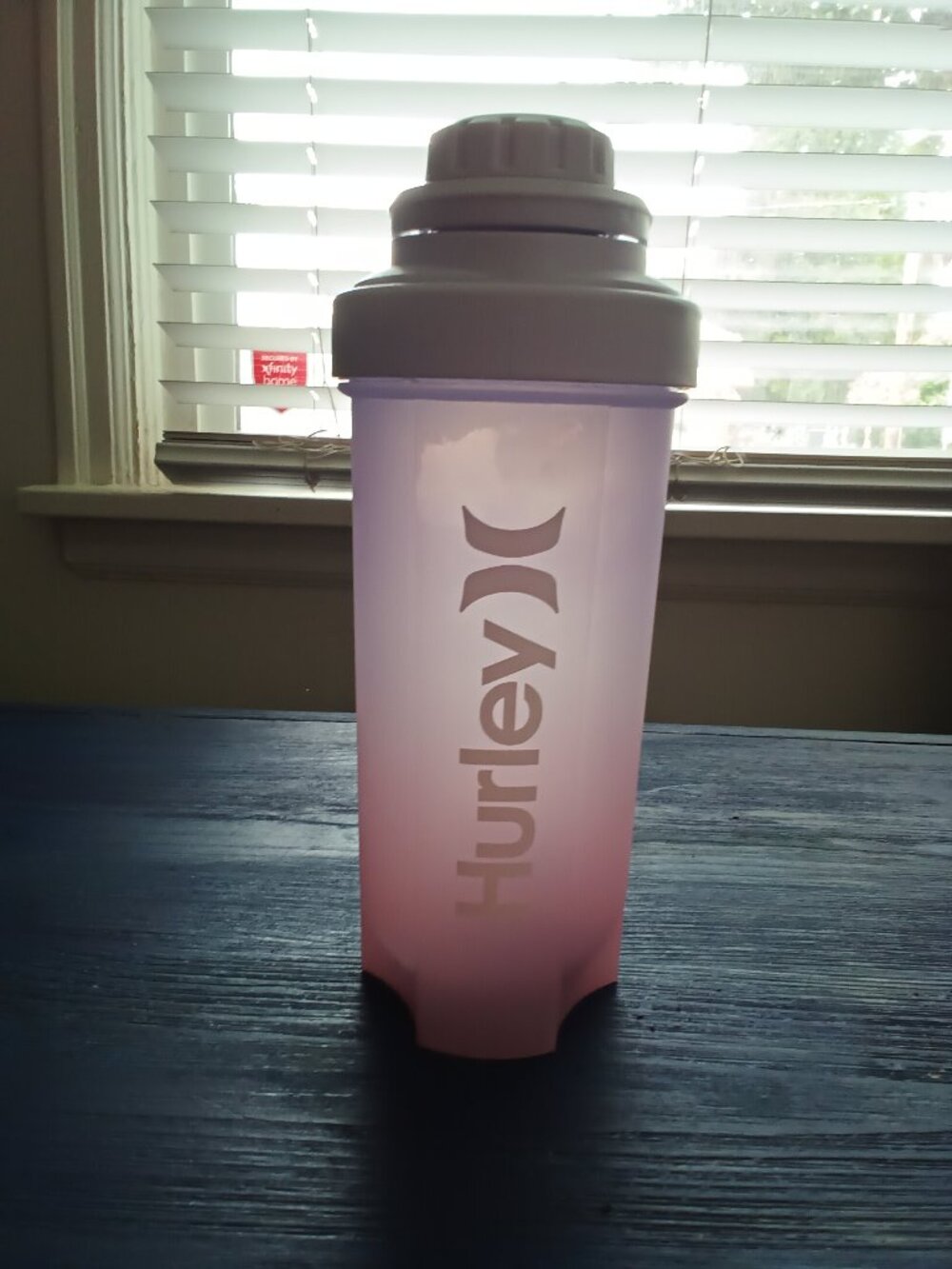 Hurley pink/purple ombre 24 oz./700 mil water bottle with shaker ball.